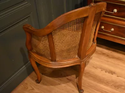 Fauteuil de bureau canné de style Louis XV